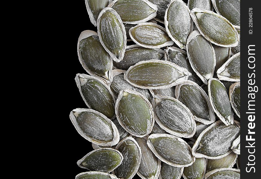 Closeup of pumpkin kernels in shells