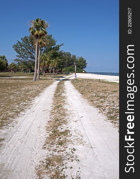 Dirt road alongside the Fort De Soto beach, Florida. Dirt road alongside the Fort De Soto beach, Florida.