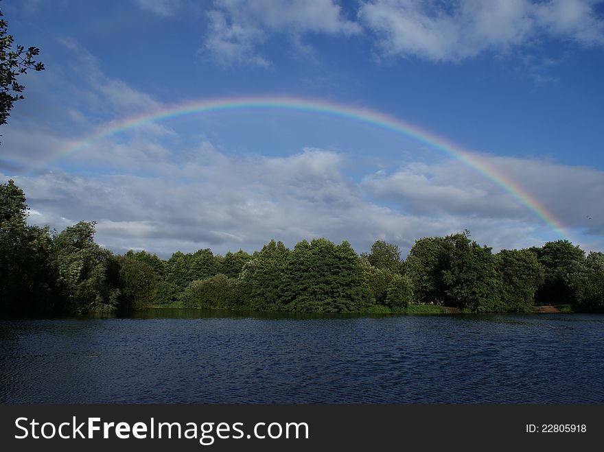Rainbow over a lake in Norfolk. Rainbow over a lake in Norfolk