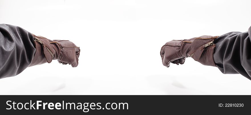Men's hands with leather gloves holding something, isolated on white background. Men's hands with leather gloves holding something, isolated on white background