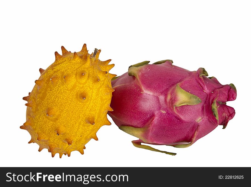 A cut-out of a kiwano and a pitahaya. A cut-out of a kiwano and a pitahaya