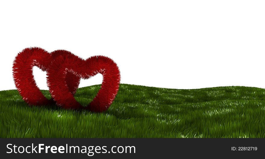 Two fluffy hearts on a green field