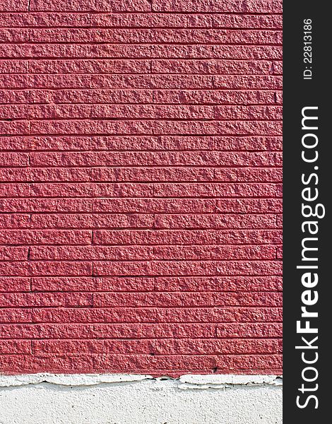 The surface is made of brick red background. The surface is made of brick red background.