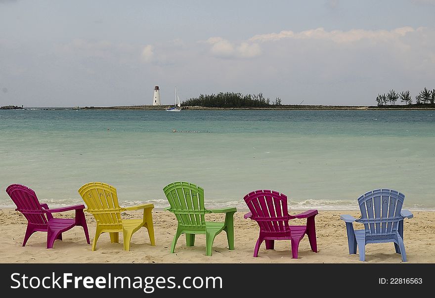 Colored chairs on the beach in Bahamas