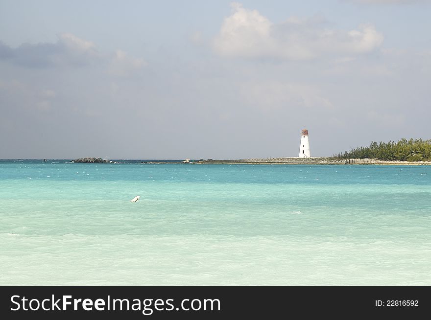 White lighthouse in Nassau, Bahamas by the beach. White lighthouse in Nassau, Bahamas by the beach