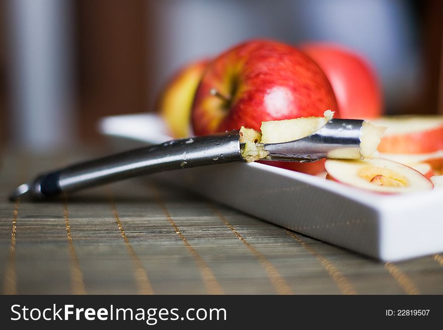 Taking out an apple core. Taking out an apple core