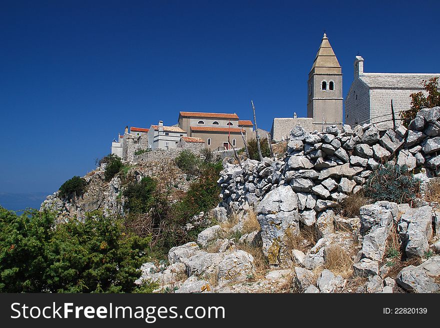 The old village on a rock on the Croatian island of Cres. The old village on a rock on the Croatian island of Cres