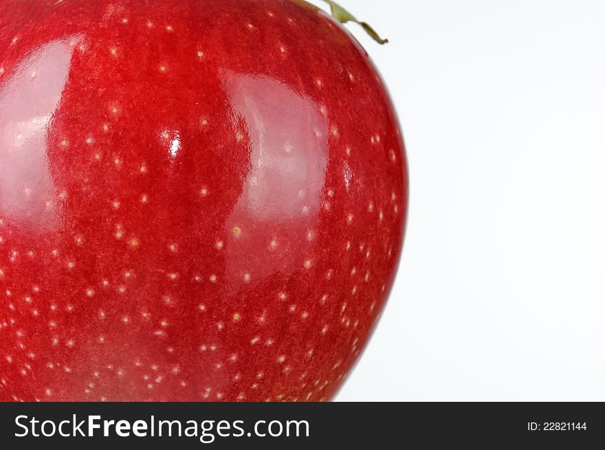 A shiny red apple with copy space