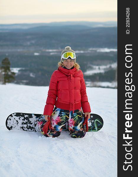 Portrait of smiling girl on snowboard. Portrait of smiling girl on snowboard