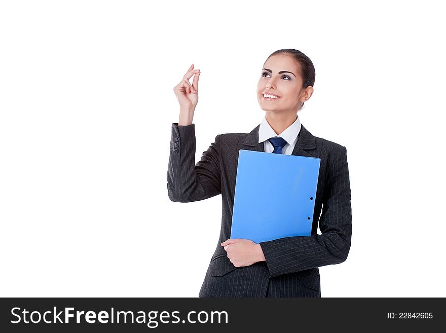 Young businesswoman standing with file folder smiling. Young businesswoman standing with file folder smiling
