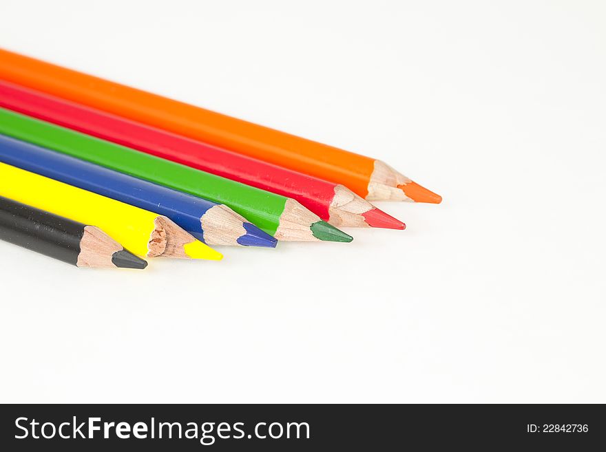 Pencils of different colors on a white background. Pencils of different colors on a white background
