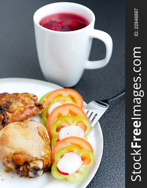 Fried Chicken Pieces And Vegetables