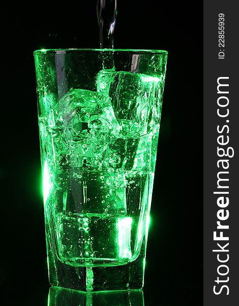Green acid cocktail with ice