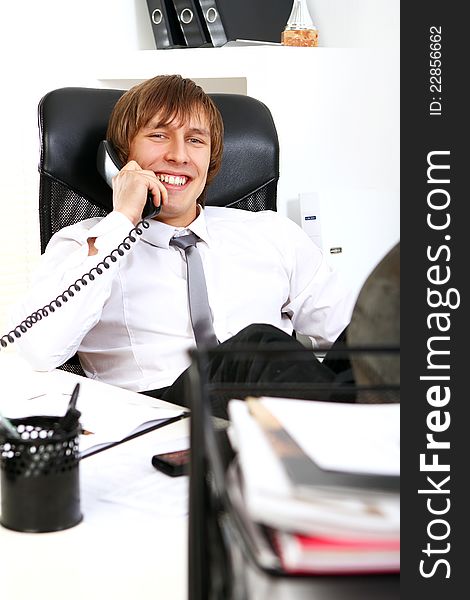 Successful Businessman Talking By Phone