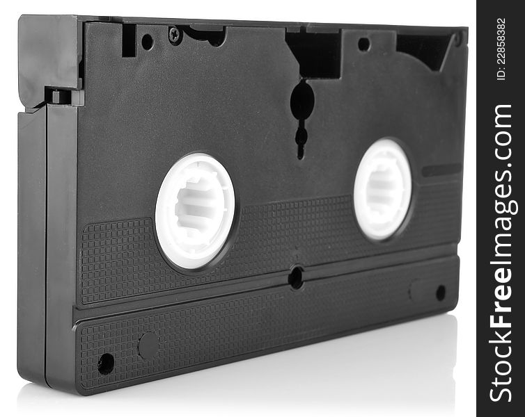Old video cassette on white background