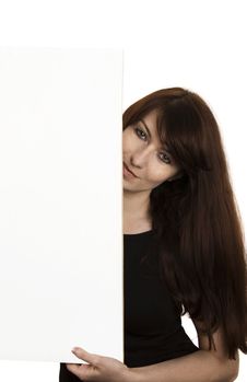 Smiling Young Woman With A Blank Board Royalty Free Stock Photography
