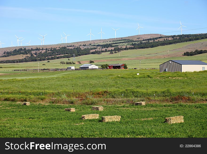 Rural Farmland And Wind Turbines.