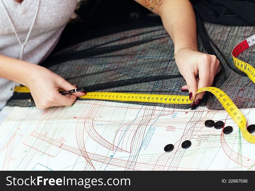 Female Hands Measuring Distance