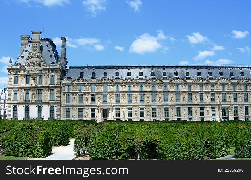 A Louvre palace view from the Tuileries Garden in Paris, France. A Louvre palace view from the Tuileries Garden in Paris, France