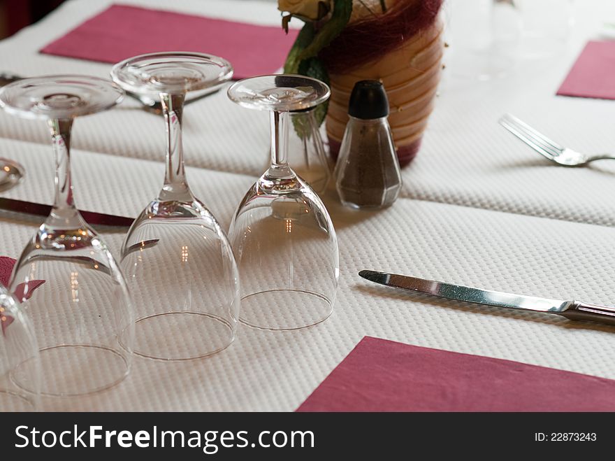 A restaurant decorated table ready to eat. A restaurant decorated table ready to eat