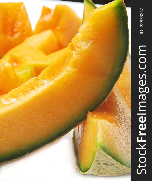 Fresh melon on plate closeup