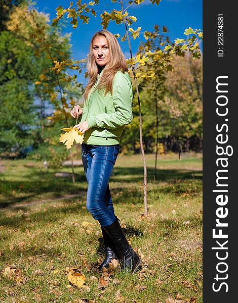 Beautiful happy girl in the autumn park. Beautiful happy girl in the autumn park