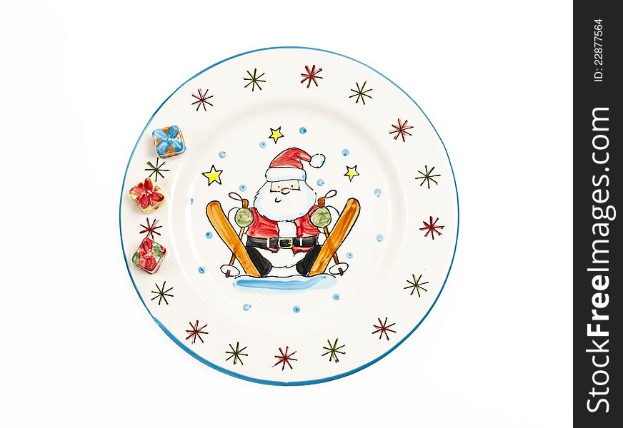 Santa Claus painting on plate isolated on white background