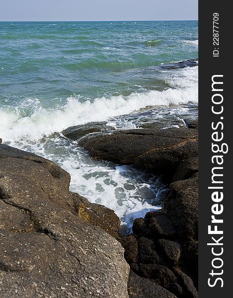 Wave Of Sea Pass Through Crack Of Stone Beach