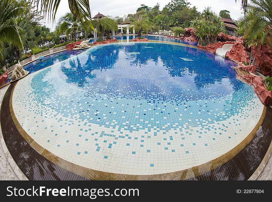 Children swimming pool decorated by shading blue mosaic