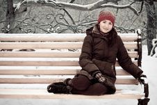 Young Woman In Winter Park On A Bench Stock Images Young Woman In Winter Park On A Bench Stock Images