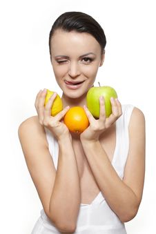Happy Girl With Fruits Lemon And Green Apple Stock Images
