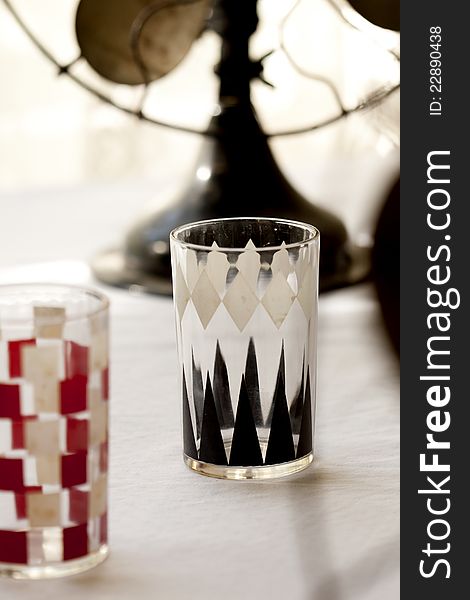 Vintage juice glasses in checkerboard and backgamm