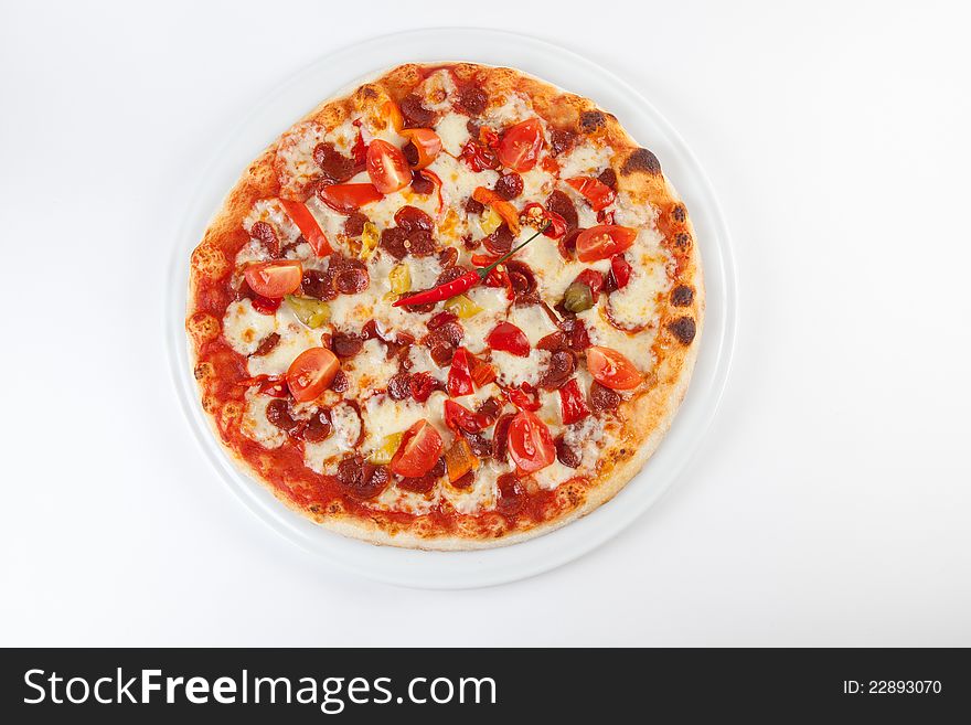 Hot red pepperoni pizza with tomatoes. Hot red pepperoni pizza with tomatoes