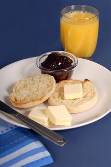 English Muffin With Butter Royalty Free Stock Photography English Muffin With Butter Royalty Free Stock Photography