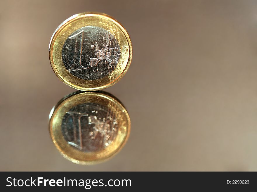 Detail of 1 EUR coin with own mirror. Detail of 1 EUR coin with own mirror