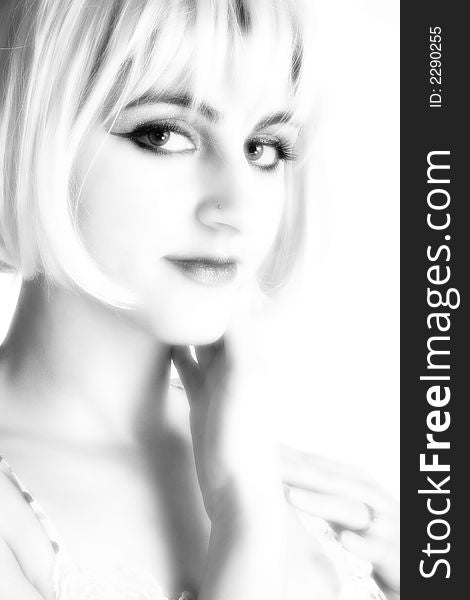 Portrait of beautiful Middle Eastern woman in black and white with blonde hair. Portrait of beautiful Middle Eastern woman in black and white with blonde hair.