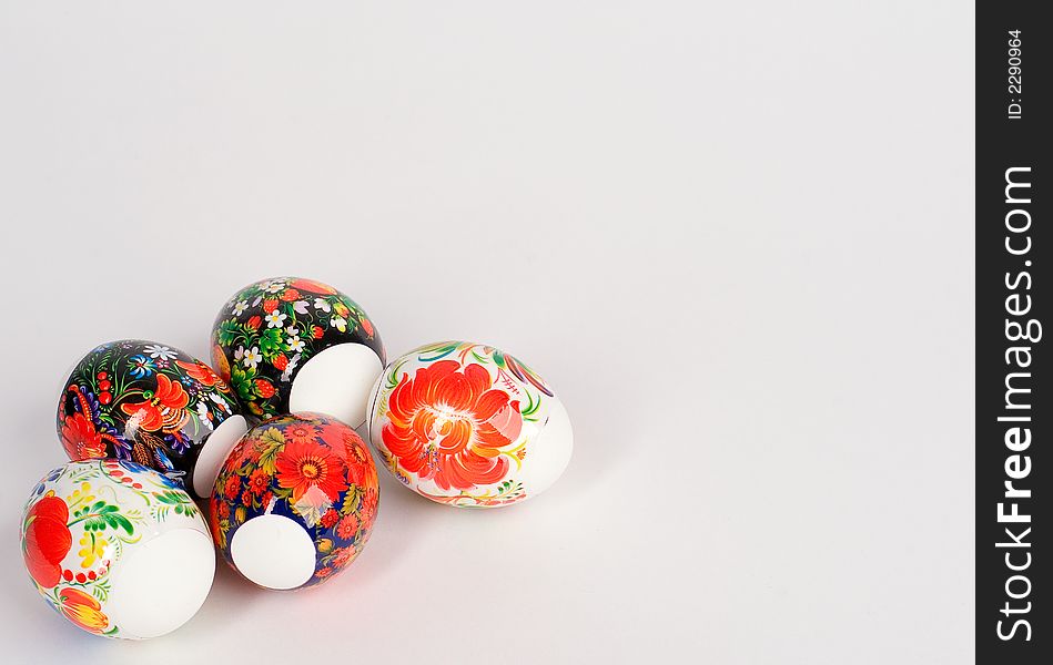 Multi-coloured easter eggs on a white background