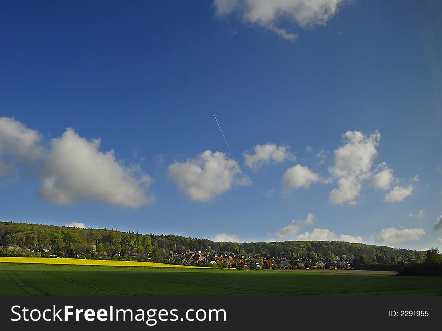 Summer landscape under blue sky