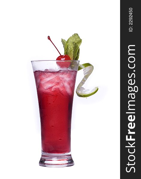 Colorful alcoholic cocktail in a tall glass against white background. Colorful alcoholic cocktail in a tall glass against white background