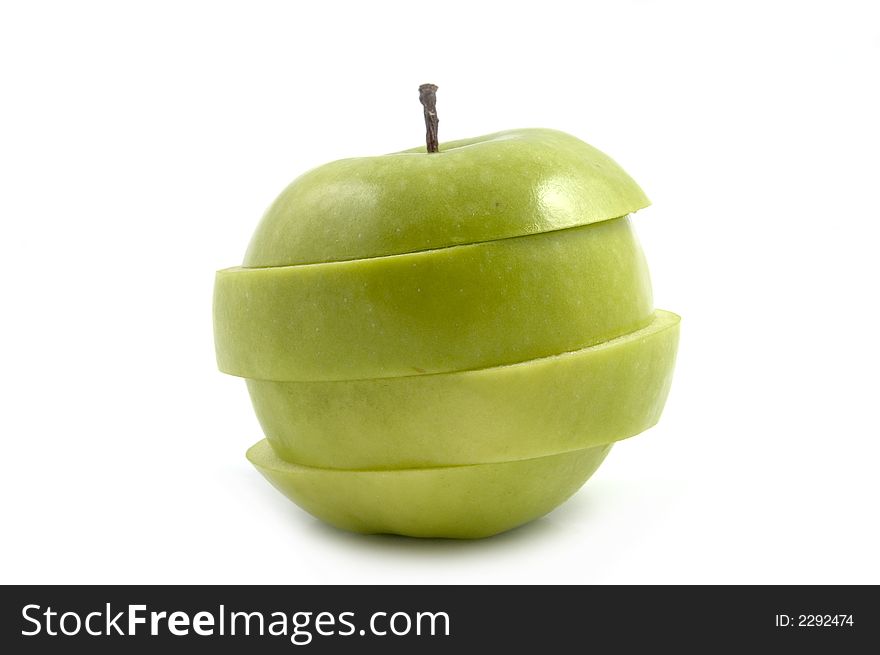 Sliced up Green Apple on white background