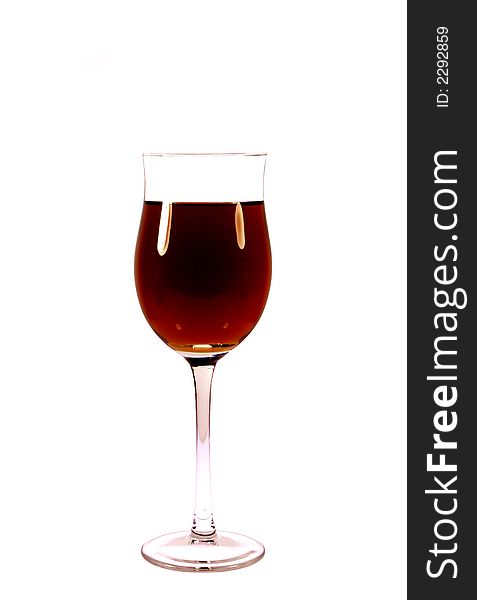 Red wine in glass on the white background