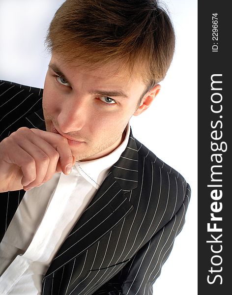 Portrait of  young confident businessman in  black suit on  white background. Portrait of  young confident businessman in  black suit on  white background