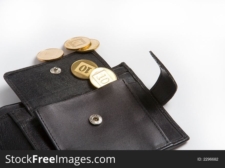 Open wallet with gold coins