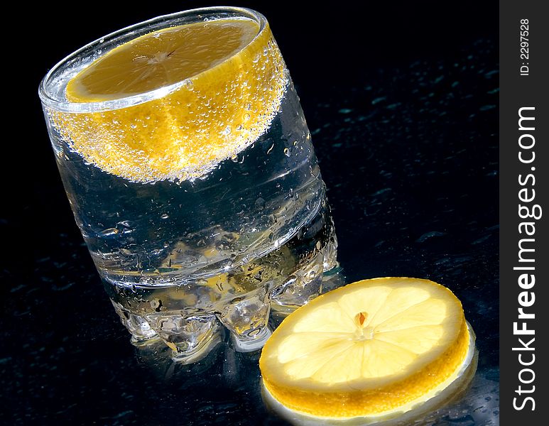 Glass of water with a lemon