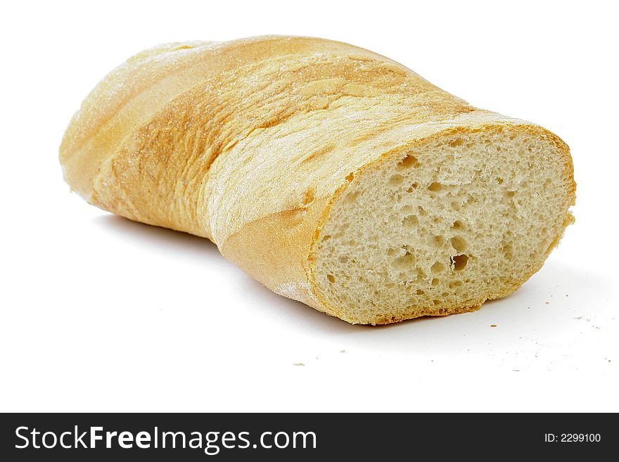Cut bun/bread roll. White background.
