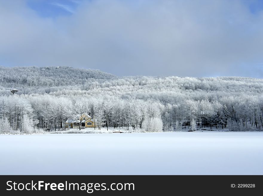 A perfect place to relax, near a frozen lake, lost in the woods. A perfect place to relax, near a frozen lake, lost in the woods