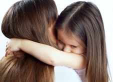 Little Cute Girl Hugging Her Mother S Neck Stock Photography