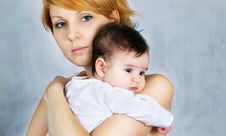 Mom Holding A Beautiful Baby Stock Image Mom Holding A Beautiful Baby Stock Image