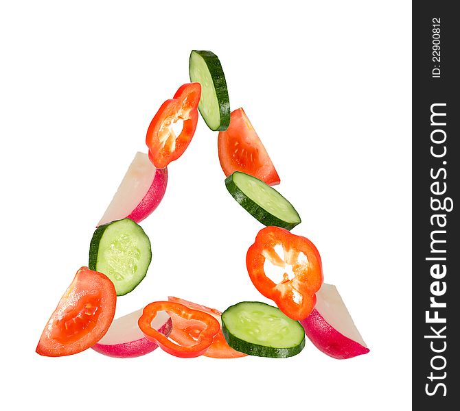 The cut vegetables lie in form triangle. The cut vegetables lie in form triangle