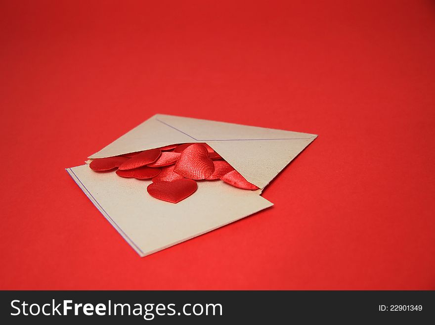 Blanc envelope with red heart on red. Blanc envelope with red heart on red